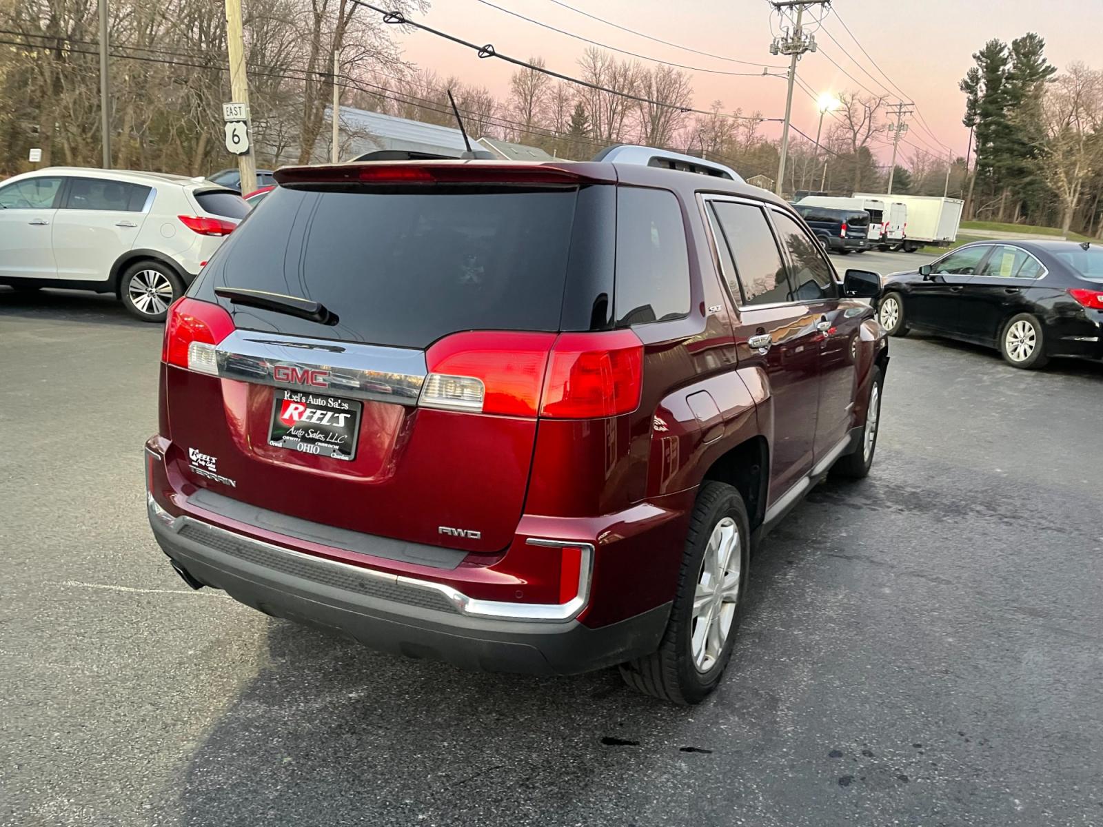 2016 Red /Black GMC Terrain SLT AWD (2GKFLUEK3G6) with an 2.4L I4 DOHC 16V engine, 6A transmission, located at 11115 Chardon Rd. , Chardon, OH, 44024, (440) 214-9705, 41.580246, -81.241943 - This 2016 GMC Terrain SLT AWD is a stylish and versatile SUV that offers a comfortable driving experience and plenty of features. With all-wheel drive, this vehicle is perfect for those who live in areas with harsh weather conditions. The 2.4-liter engine provides sufficient power and good fuel effi - Photo #8